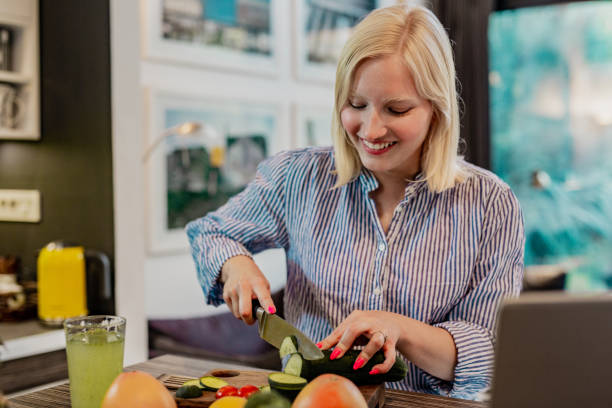 istock Young woman exploring new recipes online 1257378625