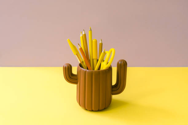 istock Stationery on brown and yellow. 1257380799
