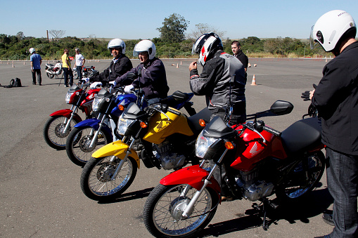 campinas, sao paulo / brazil - july 31, 2013: motorcyclists are seen during test drive with Honda model CG motorcycles in the city of Campinas.