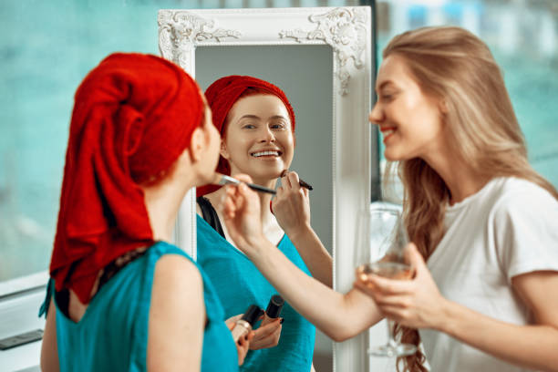 istock Doing the makeup of my best friend 1257385810
