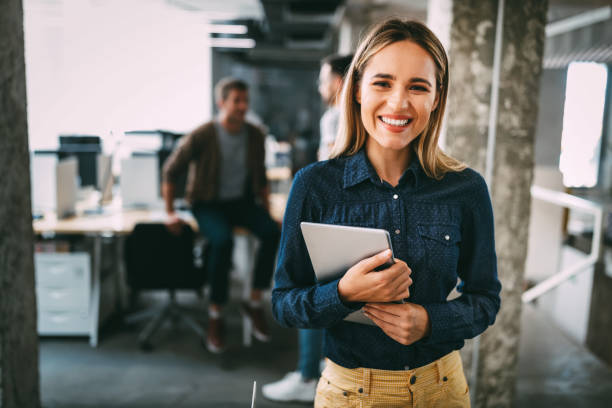 istock Successful company with happy employees in modern office 1257391960
