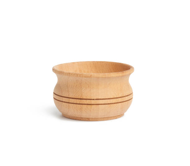 istock empty brown round wooden plate isolated on white background 1257395055