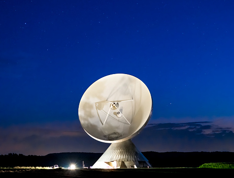 Night sky over parabolic antennas of the earth station Raisting, Bavaria, Germany, Europe