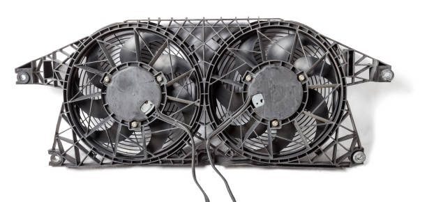 istock Engine radiator cooling fan with two propellers on a white isolated background in a photo studio. Spare part for car repair in a workshop or for sale. Car parts catalog. 1257396714