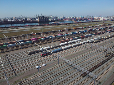 Branches of the railway at the marshalling yard, a lot of freight wagons from the height in the netherlands