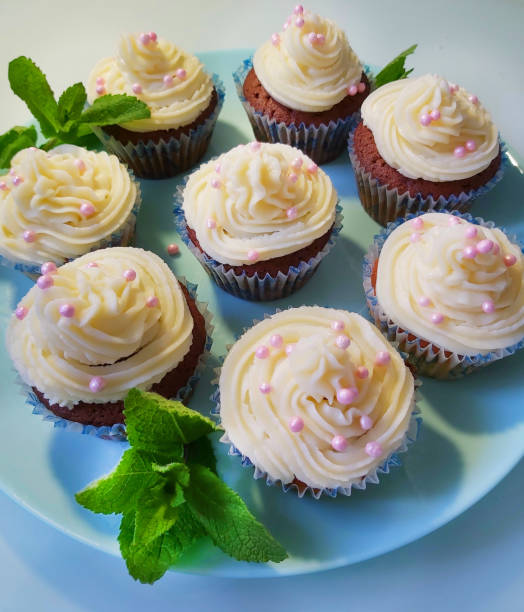 istock Sweet mint cupcakes with cream.Texture or background 1257397855