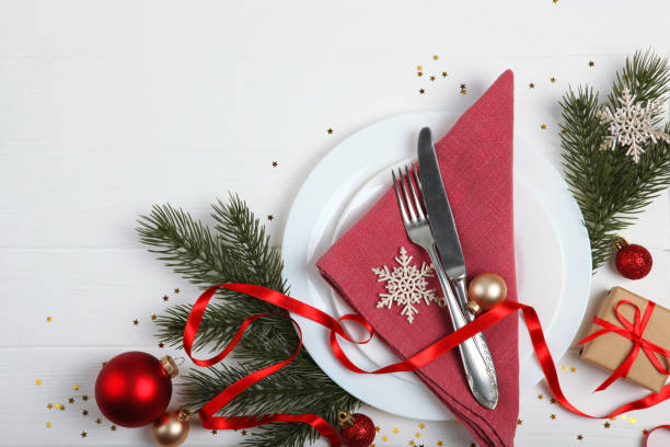 istock table setting for christmas or new year holiday top view. Mirimalism, place for text 1257399625