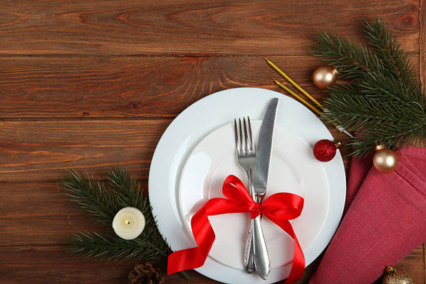 istock table setting for christmas or new year holiday top view. Mirimalism, place for text 1257399662