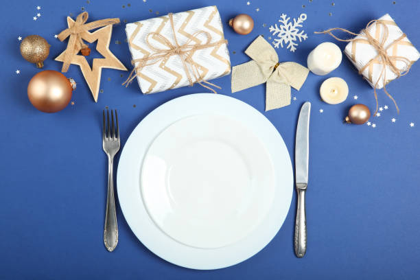 istock table setting for christmas or new year holiday top view. Mirimalism, place for text 1257399814