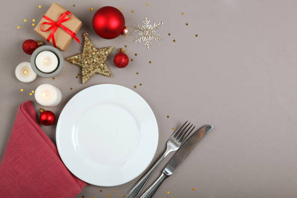 istock table setting for christmas or new year holiday top view. Mirimalism, place for text 1257399986