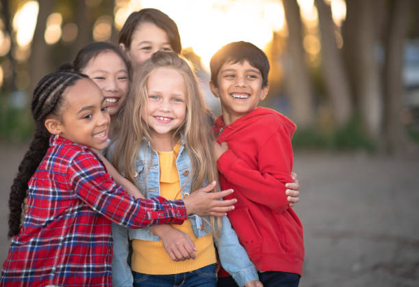 istock Portrait of diverse friend group smiling 1257401064