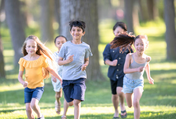 istock Kids running outside in the summertime 1257401072