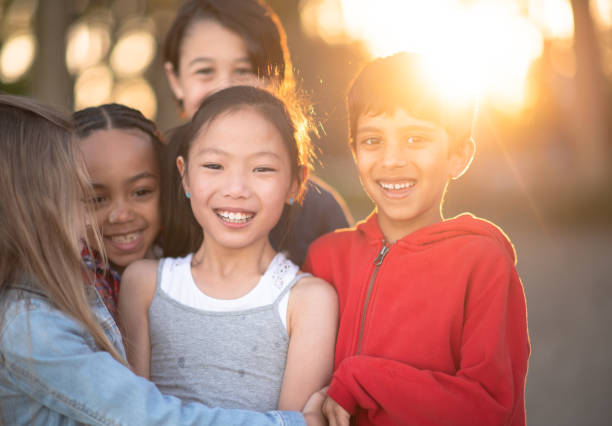 istock Portrait of diverse friend group smiling 1257401074