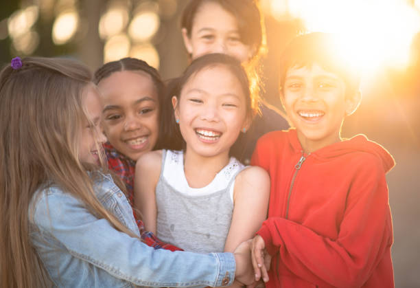 istock Portrait of diverse friend group smiling 1257401075