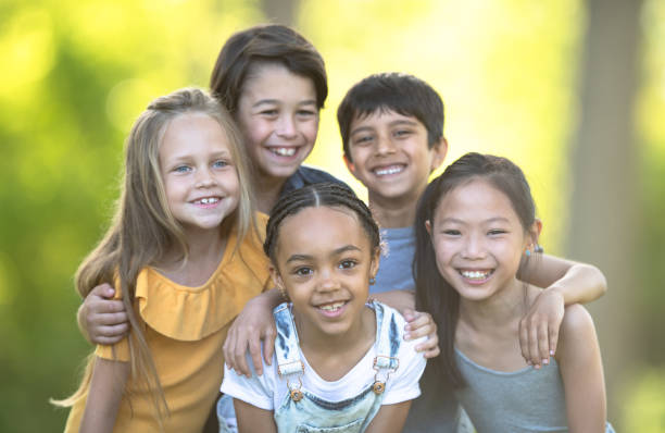 istock Portrait of diverse friend group smiling 1257401079