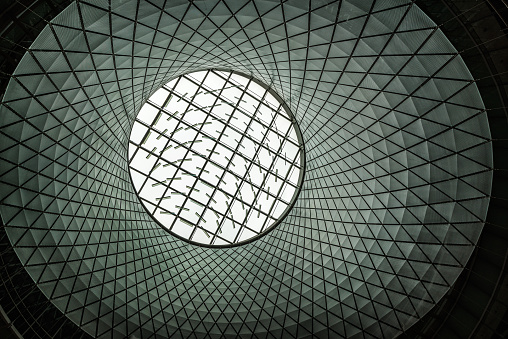 New York City, NY, USA - April 9, 2018: The glass and metal oculus (Sky Reflector-Net) of the Fulton Center transportation hub located in Lower Manhattan