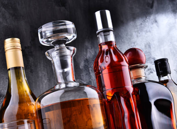 istock Carafe and bottles of assorted alcoholic beverages. 1257406780