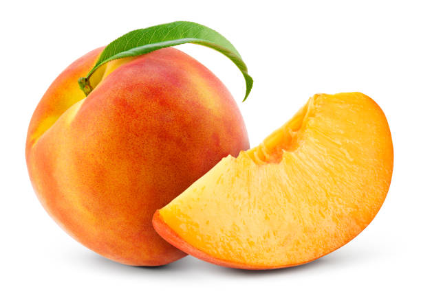 istock Peach isolate. Peach slice and whole with leaf on white. Peaches. Full depth of field. 1257406947