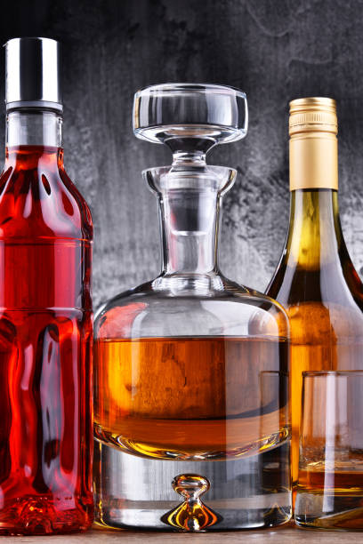 istock Carafe and bottles of assorted alcoholic beverages. 1257407035