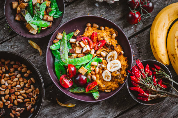 Sweet Potato Banana Curry with Peanut Butter Vegan and Organic Sweet Potato Banana Curry with Peanut Butter curry meal stock pictures, royalty-free photos & images