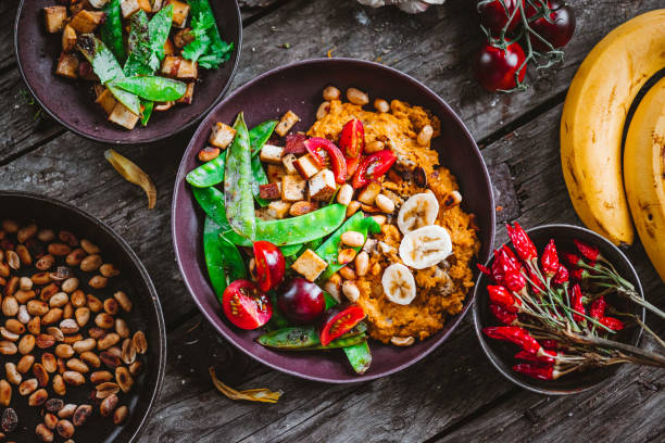 sweet potato banana curry with peanut butter - peanut food snack healthy eating imagens e fotografias de stock