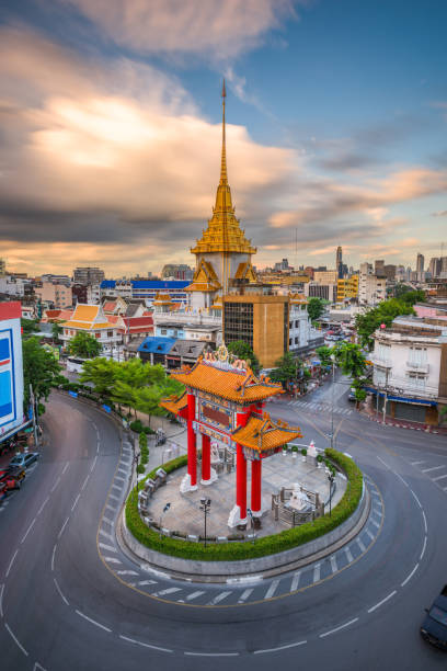 istock Bangkok, Thailand at Chinatown's traffic circle and Wat Traimit. 1257410825