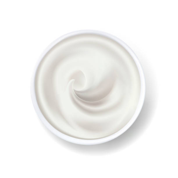 istock Cream in bowl, yogurt, mayonnaise or sour cream 1257411028