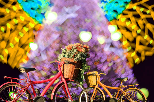 istock blur heart shape love valentine day on red tree in garden night 1257411708