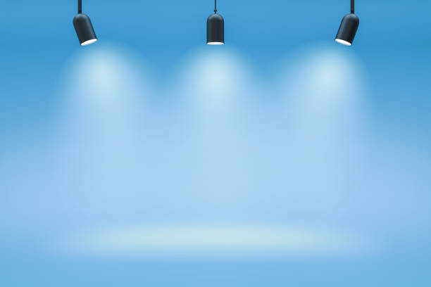 istock Empty photo studio backdrops and spotlight on blue room background with showing scene. Gradient blue or blank room. 3D rendering. 1257413558
