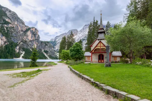 Evening view of the famous Lake Bryce and the little chapel (Kapelle Pragser Wildsee)