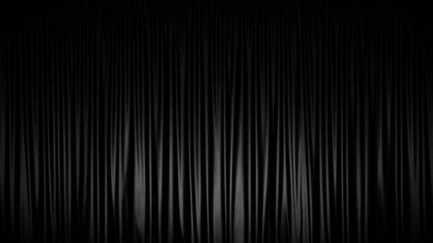 istock Black wavy curtain or drapes abstract background 1257420644