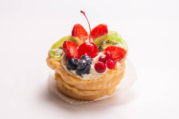 istock Home made cake with cream and fruits isolated. 1257425822