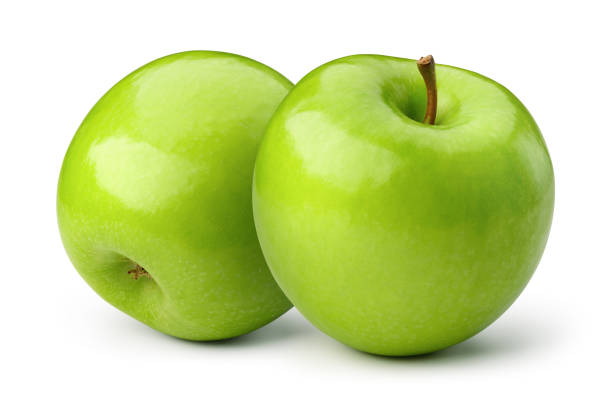 istock Green apples isolate. Apple on white background. Two green apples with clipping path. 1257426692