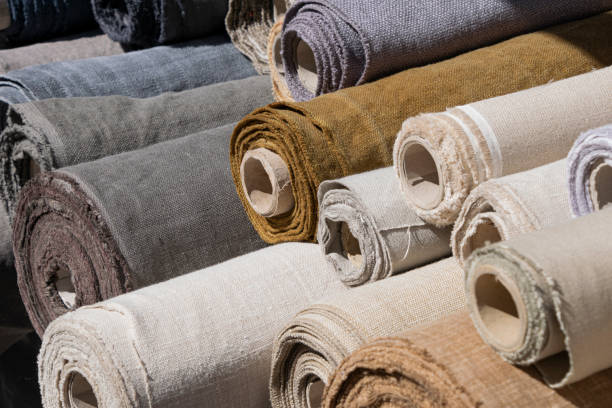 istock Rolls of linen canvas textile on market stall 1257427017