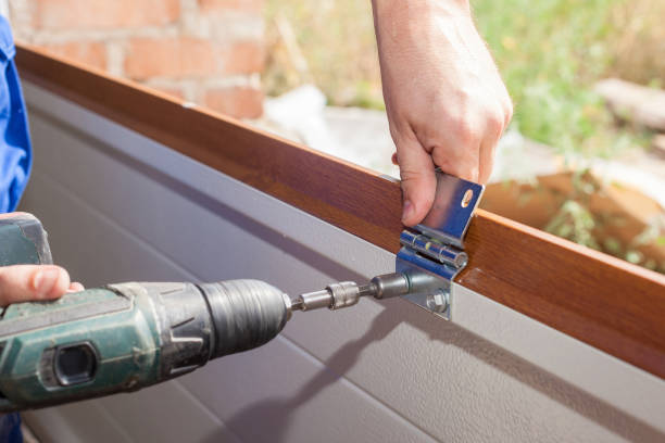 istock Professional worker install garage doors at new house 1257429566
