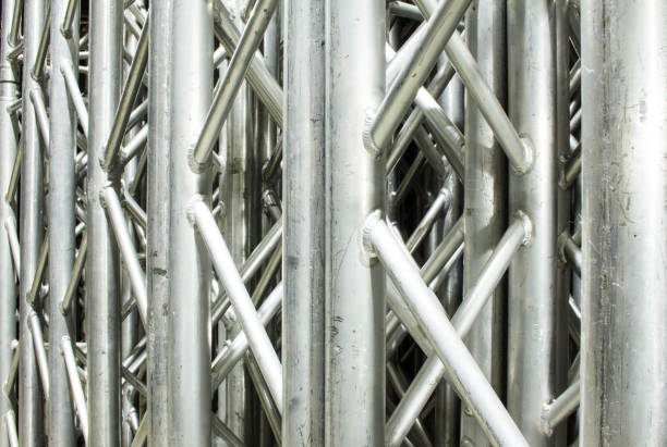 Rigging steel trusses for stage building and installation of professional constructions.