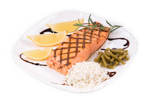istock Roasted salmon fillets with rice. 1257433770
