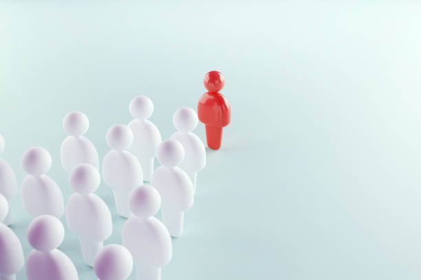 istock Leadership concept, using red human symbol among white. 1257436371