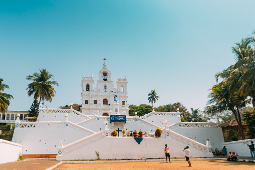 Panaji, Goa, India - February 19, 2020: People Walking Near Our Lady Of The Immaculate Conception Church Is Located In Panjim. Famous Landmark And Historical Heritage. Popular Destination Scenic.