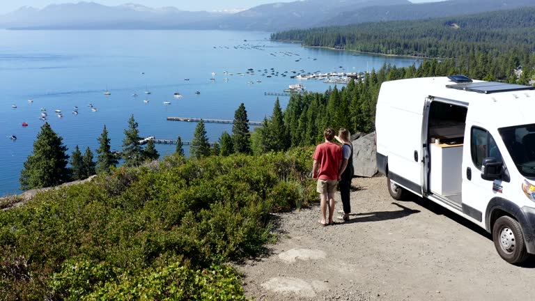 Young Couple Parked Van at a Viewpoint of Lake Tahoe