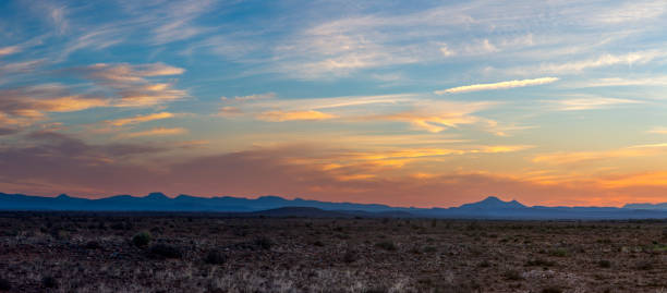 istock Blue Sneeuberg mountains in a distance after sunset 1257441023