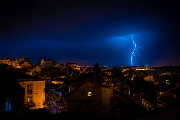 istock Thunderstorm in summer night in Lisbon, Portugal 1257443657