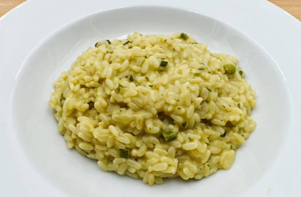 istock Risotto with asparagus on white dish 1257443727