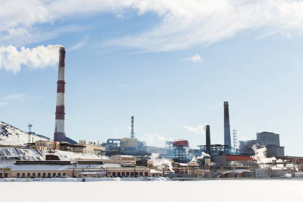 istock Heavy industrial with pipes and smoke. 1257443785