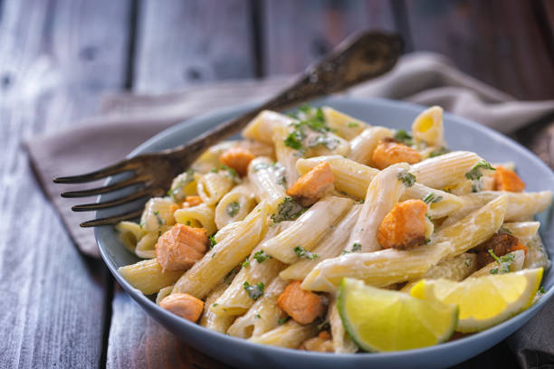 Traditional Italian Penne pasta with smoked salmon sauce.