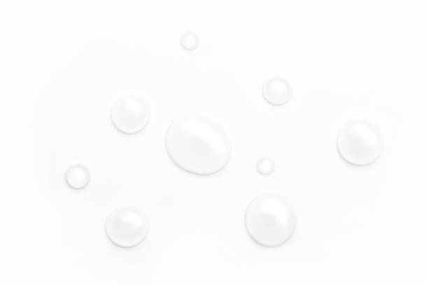 istock drops of water on a white background, top view. minimalism. purity 1257445960