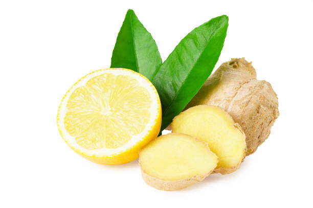 istock ginger roots with slices, green leaves and lemons isolated on white background 1257446076