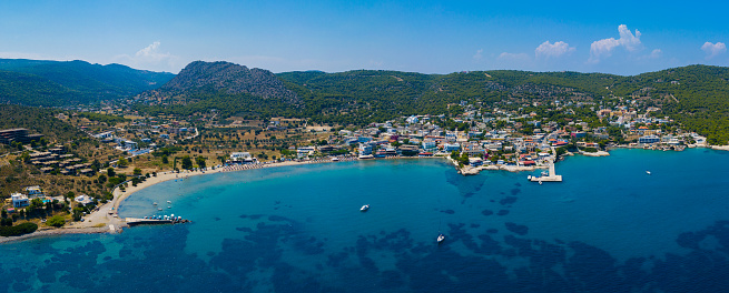 Aegina, Egina, aerial panoramic photo of the town, port and beach of Agia Marina at summer