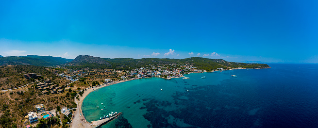 Aegina, Egina, aerial panoramic photo of the town, port and beach of Agia Marina at summer