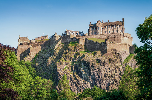 A view from Arthur's Seat to the Salisbury Crags with Edinburgh in the background.